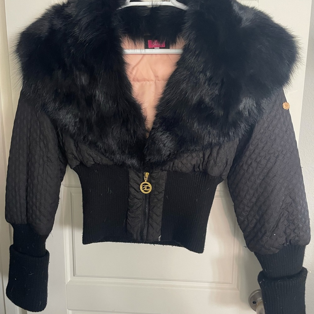 A real black fur coat !